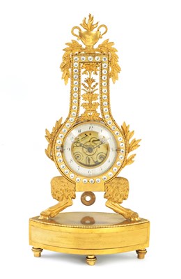 Lot 585 - AN EARLY 19TH CENTURY FRENCH ORMOLU LIAR SHAPED MANTEL CLOCK