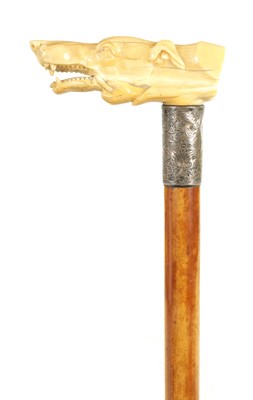 Lot 300 - A LATE 19TH CENTURY IVORY DOG'S HEAD HANDLED WALKING STICK