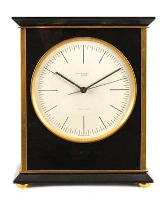 Lot 543 - A MID 20TH CENTURY EBONISED AND GILT BRASS MANTEL CLOCK