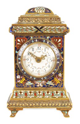 Lot 553 - A LATE 19TH CENTURY FRENCH BRASS AND COLOURED CHAMPLEVE ENAMEL SMALL MANTEL CLOCK