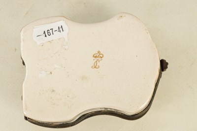 Lot 27 - A 19TH CENTURY FRENCH FAIENCE SHAPED DRESSING TABLE BOX