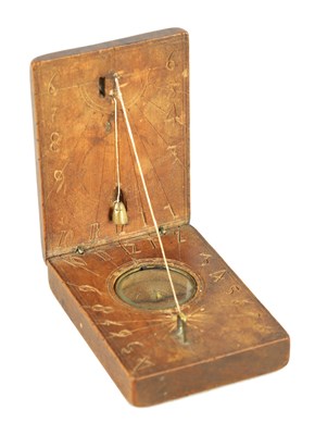 Lot 319 - AN 18TH CENTURY CONTINENTAL WALNUT POCKET SUNDIAL/COMPASS