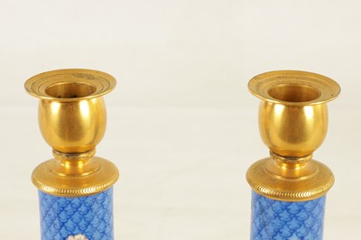 Lot 32 - A PAIR OF 19TH CENTURY ORMOLU MOUNTED SEVRES STYLE PORCELAIN CANDLESTICKS