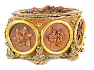 Lot 348 - A FINELY CARVED 19TH CENTURY FRENCH OVAL ORMOLU MOUNTED JEWELLERY CASKET