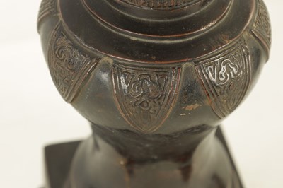 Lot 82 - AN EARLY CHINESE PATINATED BRONZE VASE