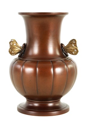 Lot 147 - A JAPANESE MEIJI PERIOD PATINATED BRONZE BUTTERFLY VASE
