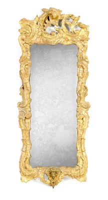 Lot 676 - A 17TH CENTURY CARVED GILT WOOD ROCOCO STYLE HANGING MIRROR