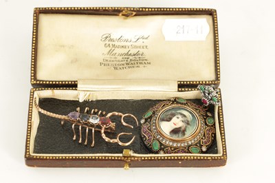 Lot 177 - TWO LADIES GOLD AND SILVER GEM SET BROOCHES