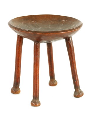 Lot 635 - A 19TH CENTURY AFRICAN TRIBAL HARDWOOD STOOL