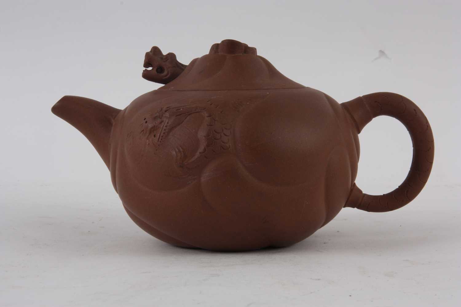 Lot 63 A 19TH CENTURY CHINESE TERRACOTTA TEAPOT