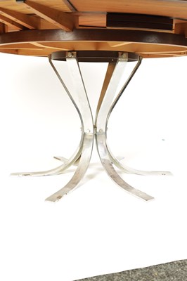 Lot 964 - A 1960’S DANISH FIGURED ROSEWOOD ‘FLIP-FLAP’ EXTENDING CIRCULAR DINING TABLE BY DYRLUND