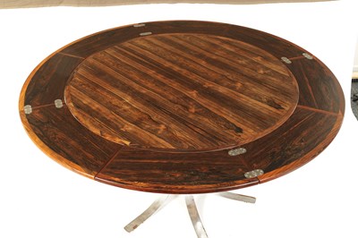Lot 964 - A 1960’S DANISH FIGURED ROSEWOOD ‘FLIP-FLAP’ EXTENDING CIRCULAR DINING TABLE BY DYRLUND