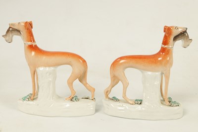 Lot 159 - A PAIR OF  19TH CENTURY STAFFORDSHIRE GREYHOUNDS