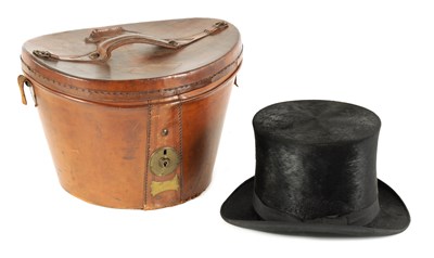 Lot 349 - A 19TH CENTURY BLACK SILK GENTLEMAN’S TOP HAT