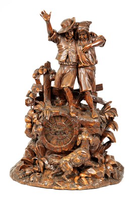 Lot 608 - A LARGE LATE 19TH CENTURY CARVED BLACK FOREST FIGURAL CLOCK