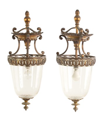 Lot 401 - A PAIR OF EARLY 20TH CENTURY GILT BRASS HANGING LANTERNS