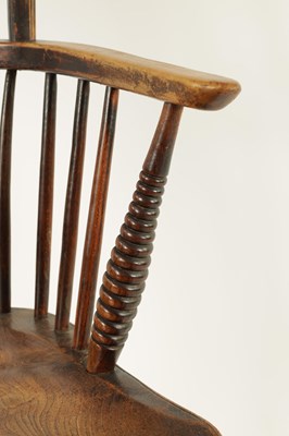 Lot 725 - AN EARLY 19TH CENTURY ELM AND ASH THAMES VALLEY WINDSOR CHAIR