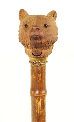 Lot 597 - AN EARLY 20TH CENTURY BLACK FOREST NOVELTY PARASOL/WALKING STICK