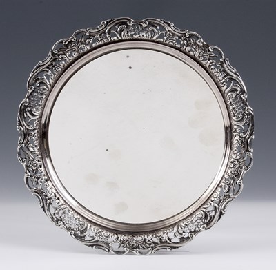 Lot 258 - A LATE 19TH CENTURY SILVER SALVER with plain...