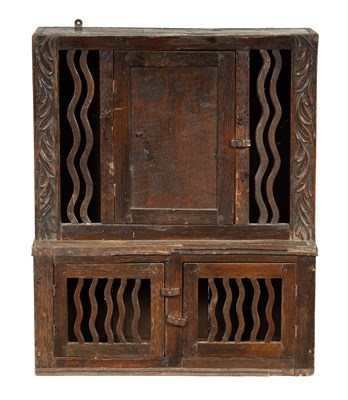 Lot 682 - A LATE 17TH CENTURY OAK HANGING FOOD CUPBOARD