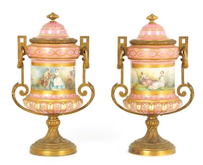 Lot 38 - A PAIR OF 19TH CENTURY SEVRES PORCELAIN AND ORMOLU MOUNTED LIDED VASES