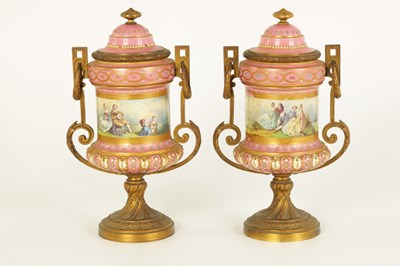 Lot 38 - A PAIR OF 19TH CENTURY SEVRES PORCELAIN AND ORMOLU MOUNTED LIDED VASES