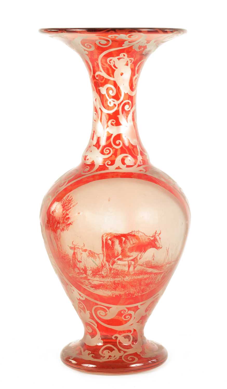 Lot 44 - A LATE 19TH CENTURY BOHEMIAN ETCHED AND CUT RUBY GLASS VASE