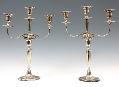 Lot 441 - A PAIR OF WALKER AND HALL SHEFFIELD THREE BRANCH SILVER PLATED CANDELABRA