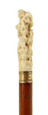 Lot 293 - A 19TH CENTURY CARVED IVORY HANDLED WALKING STICK