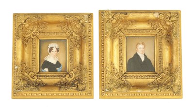 Lot 427 - A PAIR OF EARLY 19TH CENTURY  MINIATURE PORTRAITS ON IVORY OF MR AND MRS CHRISTOPHER RAWSON OF HALIFAX