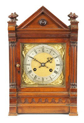 Lot 864 - A LATE 19TH CENTURY GERMAN OAK CASED MANTEL CLOCK