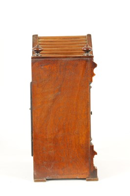 Lot 864 - A LATE 19TH CENTURY GERMAN OAK CASED MANTEL CLOCK