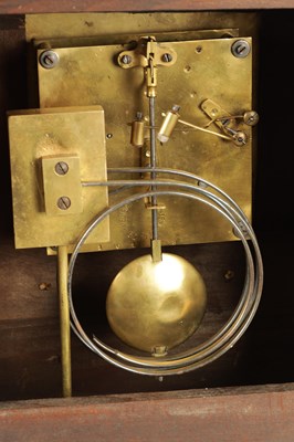 Lot 864 - A LATE 19TH CENTURY GERMAN OAK CASED MANTEL CLOCK