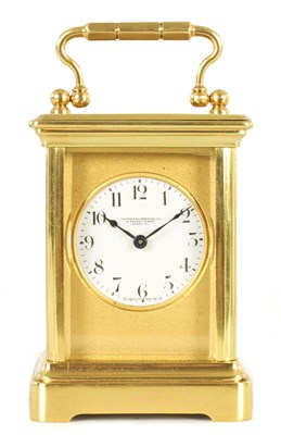 Lot 867 - GOLDSMITH GILT MASK MINIATURE CARRIAGE CLOCK