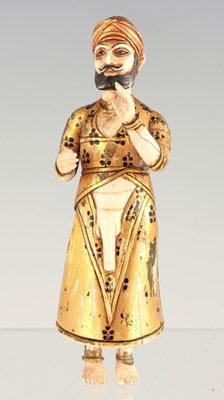 Lot 164 - A RARE 19TH CENTURY INDIAN CARVED IVORY AND GILDED FIGURE