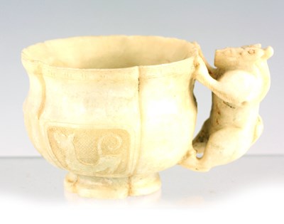 Lot 242 - A CHINESE ARCHAISTIC JADE CUP