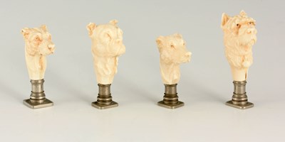 Lot 62 - A SET OF FOUR FINELY CARVED IVORY AND NICKLE SEALS