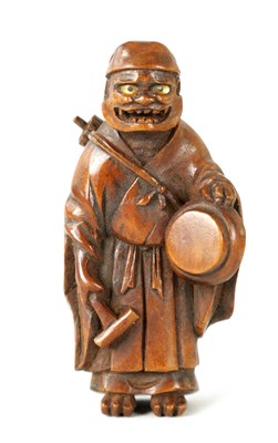 Lot 298 - A JAPANESE MEIJI PERIOD CARVED BOXWOOD NETSUKE