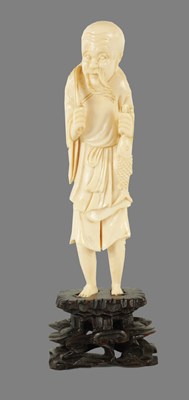 Lot 206 - A JAPANESE MEIJI PERIOD IVORY OKIMONO