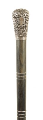 Lot 509 - A 19TH CENTURY SEGMENTED HORN AND SILVER MOUNTED WALKING STICK