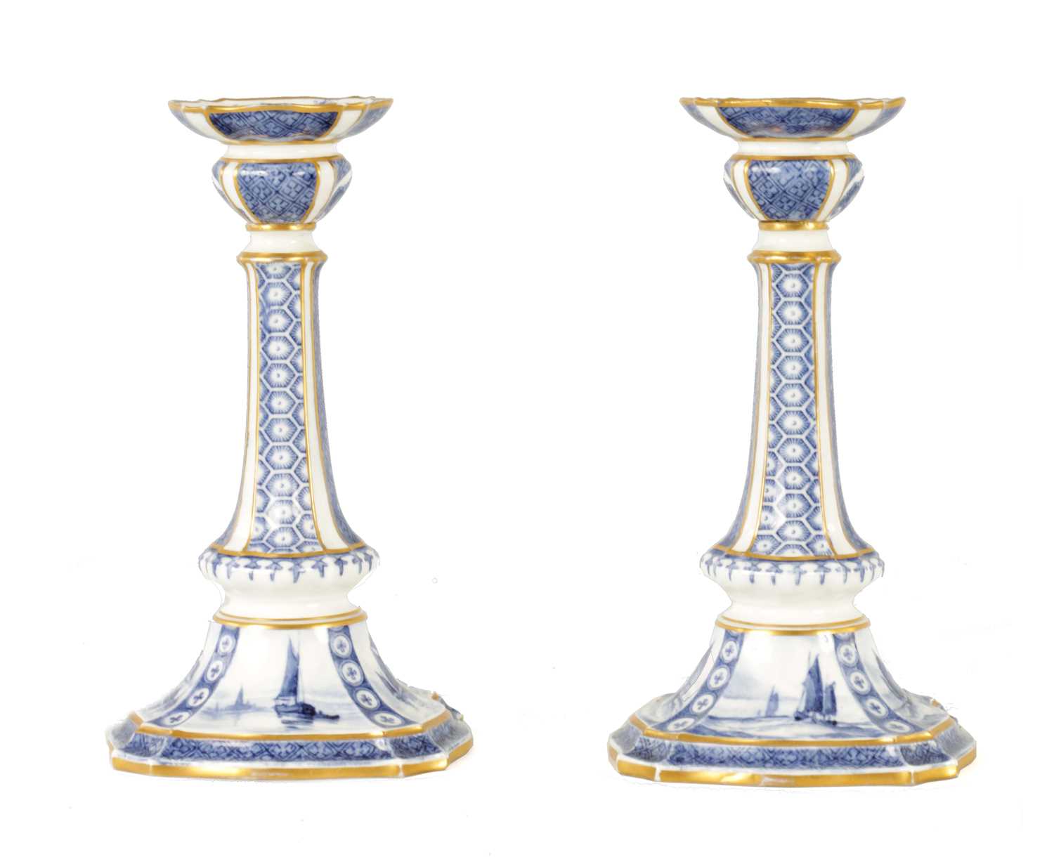 Lot 73 - A RARE PAIR OF ROYAL CROWN DERBY BLUE AND WHITE CANDLESTICKS