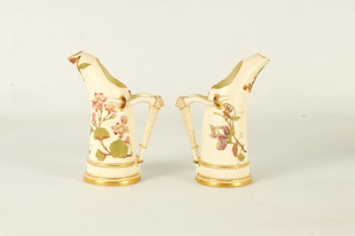 Lot 83 - A PAIR OF ROYAL WORCESTER BLUSH IVORY TUSK JUGS