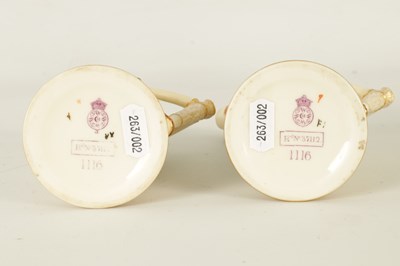 Lot 82 - A PAIR OF ROYAL WORCESTER BLUSH IVORY TUSK JUGS