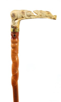 Lot 514 - A 19TH CENTURY CARVED ANTLER HORN WALKING STICK