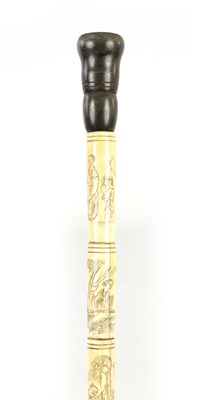 Lot 499 - A LATE 19TH CENTURY / EARLY 20TH CENTURY ORIENTAL ENGRAVED SEGMENTED BONE AND HORN WALKING STICK