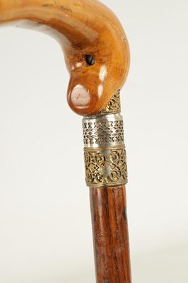 Lot 513 - A 20TH CENTURY SWORD STICK TOGETHER WITH A 20TH CENTURY SIMULATED TORTOISESHELL WALKING STICK WITH PULL OUT KOSH