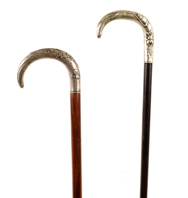 Lot 484 - TWO FRENCH ART NOUVEAU STYLE SILVER MOUNTED WALKING STICKS