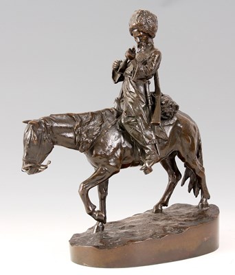 Lot 566 - A 19TH CENTURY RUSSIAN BRONZE SCULPTURE OF A...