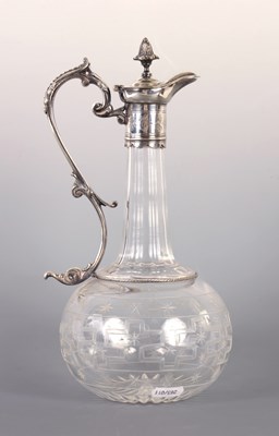 Lot 186 - A LATE 19TH CENTURY SILVER PLATED CUT GLASS CLARET JUG