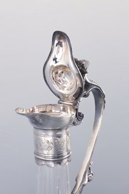 Lot 186 - A LATE 19TH CENTURY SILVER PLATED CUT GLASS CLARET JUG